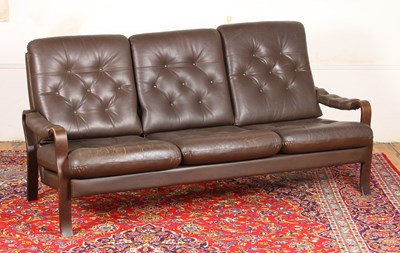 Lot 129 - A 1970s Danish brown leather button...