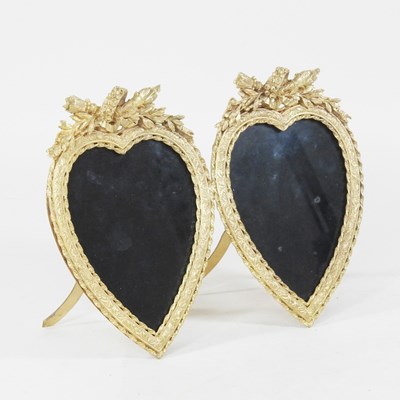 Lot 605 - A gilt bronze double heart shaped frame, 19 x...