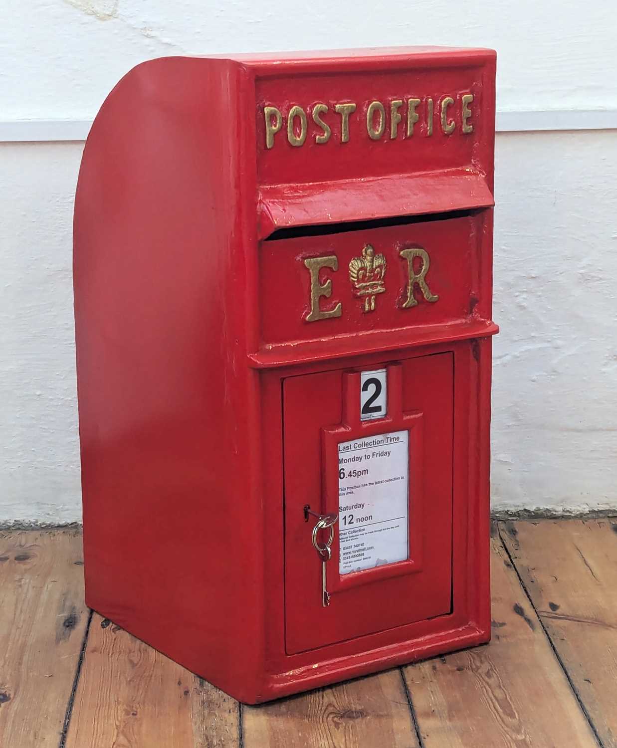Red Post Box Lock Lot 147 - A red painted cast iron post box, with key