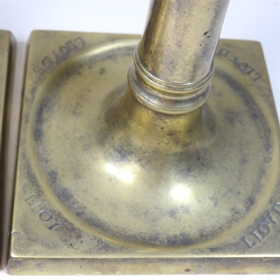 Lot 69 - A pair of George III brass table socket candlesticks