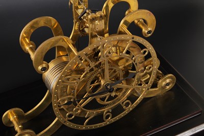 Lot 194 - A brass skeleton clock, the chapter ring...