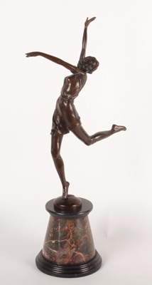 Lot 40 - An Art Deco style bronze figure of a lady, on...