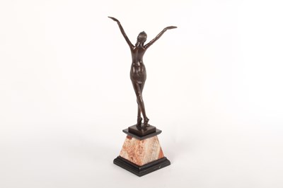 Lot 450 - A bronze Art Deco style figure of a dancer,...