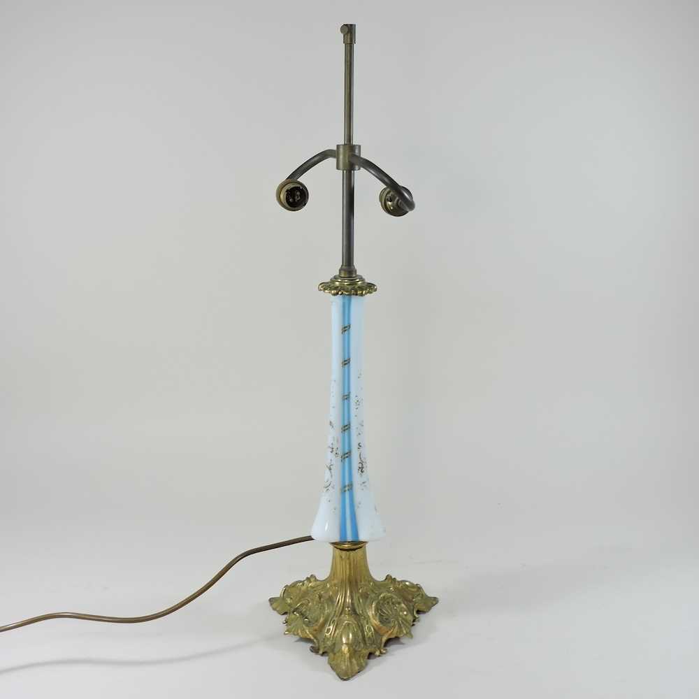 Lot 69 - A 19th century glass and brass table lamp