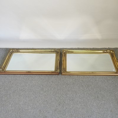 Lot 270 - A pair of gilt framed wall mirrors