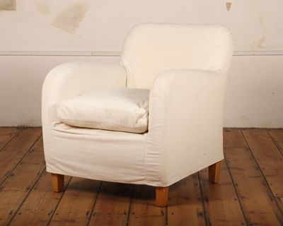 Lot 519 - A white upholstered armchair