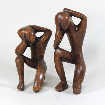 Lot 118 - A carved wooden sculpture of a man