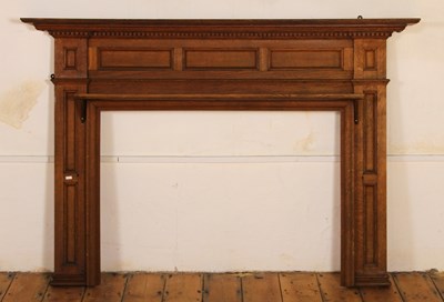 Lot 530 - An oak fire place surround, with dentil...