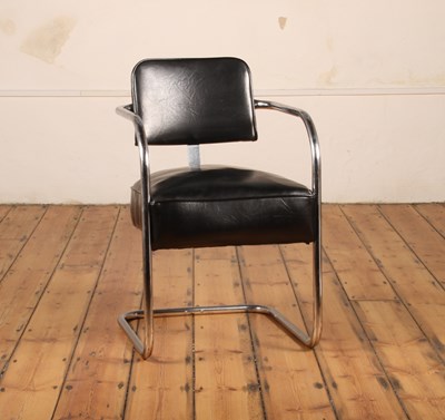 Lot 203 - A mid century chrome and black leather...