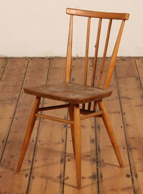 Lot 306 - An Ercol single blonde elm dining chair