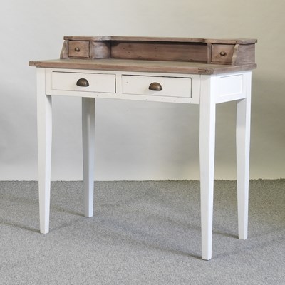 Lot 467 - A modern cream painted desk