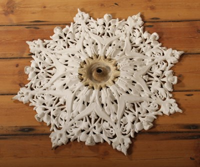 Lot 463 - A cast iron white painted ceiling rose