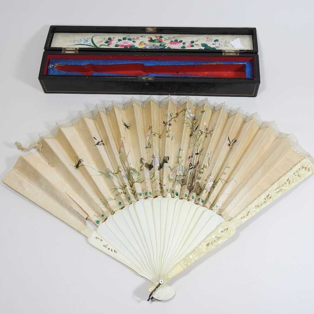 Lot 115 - A 19th century Chinese export embroidered fan