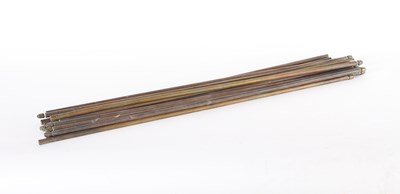 Lot 398 - A quantity of brass carpet stair rods