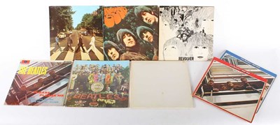 Lot 394 - The Beatles - a collection of eight LPs to...