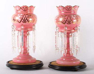 Lot 195 - A pair of Victorian pink glass table lustres,...