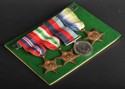 Lot 485 - A group of WWII medals, to include the War...