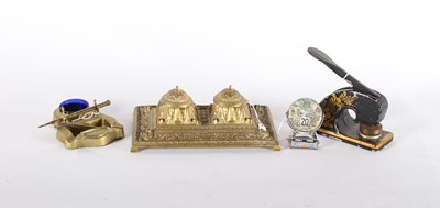 Lot 293 - A brass repousse-decorated desk stand,...