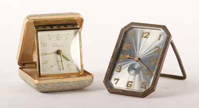 Lot 297 - An Art Deco strut clock, together with an...