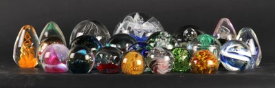 Lot 261 - A collection of coloured glass paperweights
