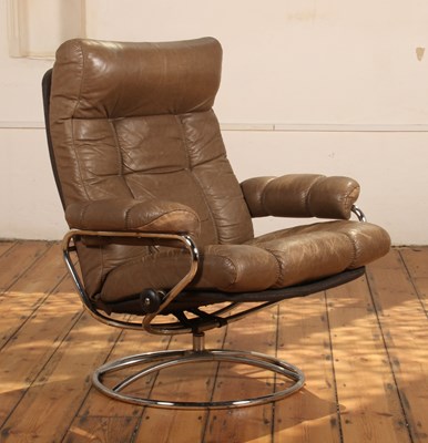 Lot 200 - A Norwegian Ekornes brown leather upholstered...