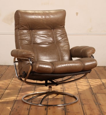 Lot 199 - A Norwegian Ekornes brown leather upholstered...