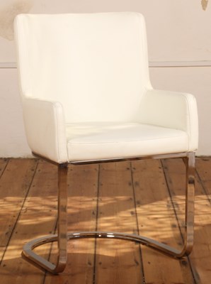 Lot 613 - A Danetti white leather upholstered chrome...