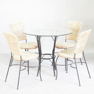 Lot 286 - A wicker and metal bistro table, 85cm wide,...