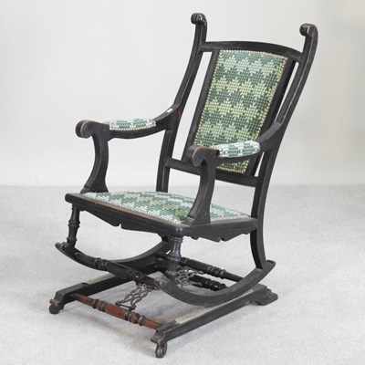 Lot 496 - An Edwardian rocking chair