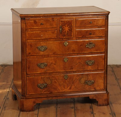 Lot 295 - A George II style burr walnut chest/cabinet