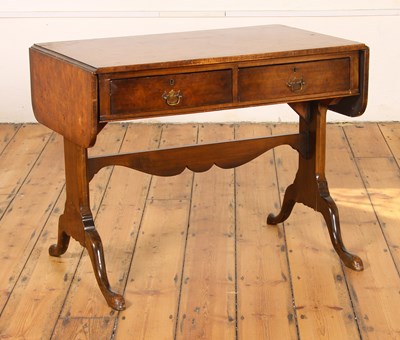 Lot 445 - A Regency style burr walnut sofa table