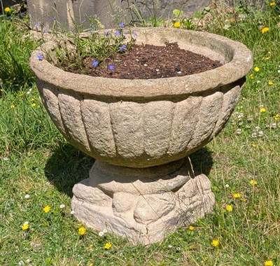 Lot 403 - A reconstituted stone garden planter