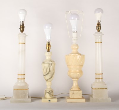Lot 388 - A pair of alabaster table lamps, together with...