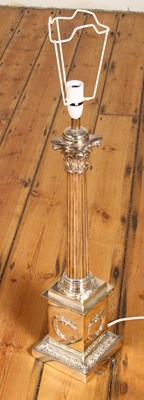 Lot 355 - A large silver plated table lamp, in the form...