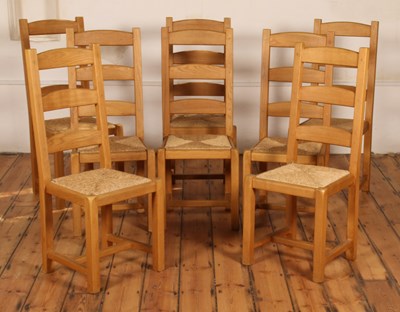 Lot 512 - A set of eight oak ladder back dining chairs,...