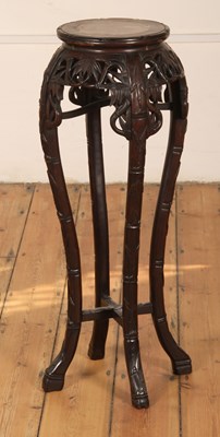 Lot 96 - A Chinese carved hardwood marble topped...
