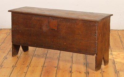 Lot 427 - An 18th century oak six plank coffer