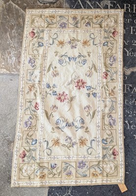 Lot 362 - A floral decorated woollen embroidery, on a...