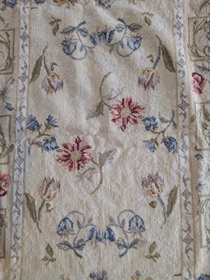 Lot 362 - A floral decorated woollen embroidery, on a...