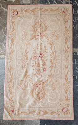 Lot 383 - An Aubusson rug, decorated with pink roses on...