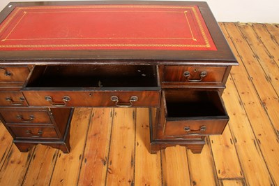 Lot 603 - A reproduction mahogany pedestal desk, having...
