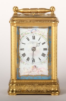 Lot 175 - A late 19th century brass and porcelain...