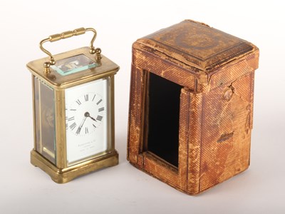 Lot 170 - A late 19th century brass carriage clock, the...