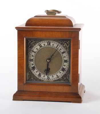 Lot 423 - A Georgian style walnut cased mantel or...