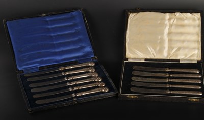 Lot 25 - Two cased sets of silver handled butter knives