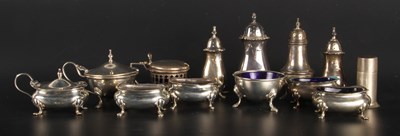 Lot 99 - A collection of silver table cruets, including...