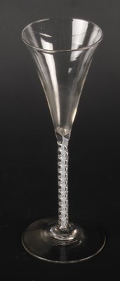 Lot 127 - A toasting glass, circa 1750, the drawn...