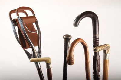 Lot 496 - A collection of six various walking sticks, to...