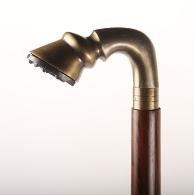 Lot 350 - A walking stick, the handle in the form of a...