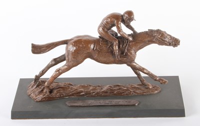 Lot 153 - A bronzed resin model of a racehorse and...
